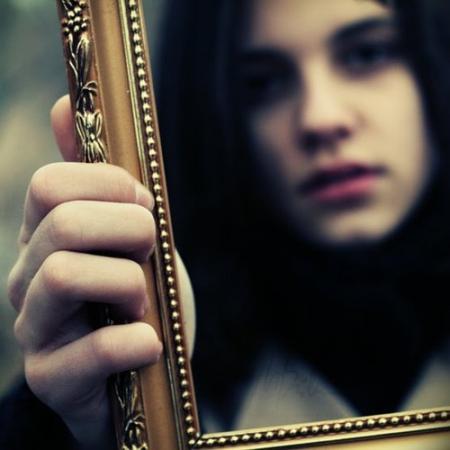 girl-looking-in-mirror.jpg