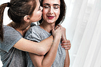 romantic-young-lesbian-couple-standing-against-white-curtain_23-2148126718_0.png