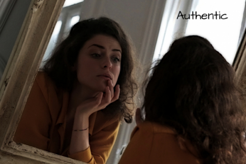 woman-in-yellow-long-sleeve-shirt-in-front-of-a-mirror-3979175-1_0.jpg